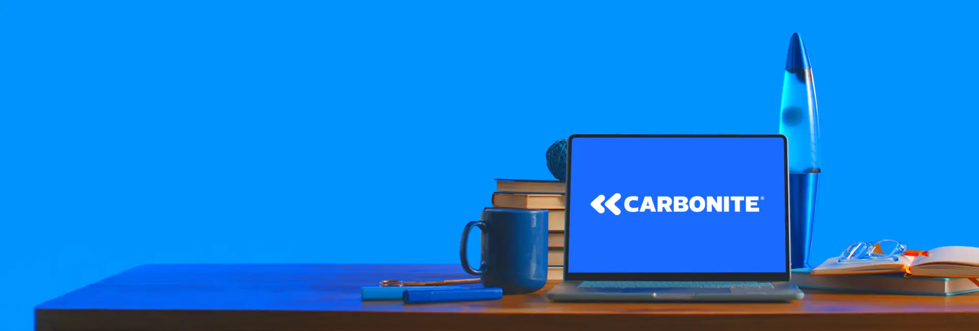 Carbonite logo displayed on desktop PC screen.