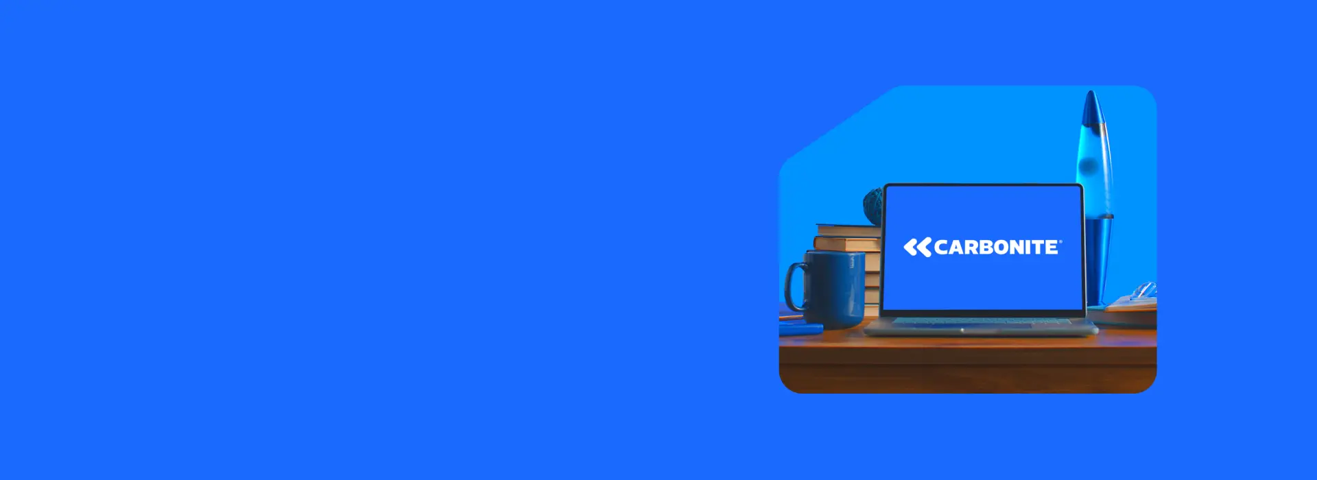 Laptop PC screen displaying Carbonite logo.
